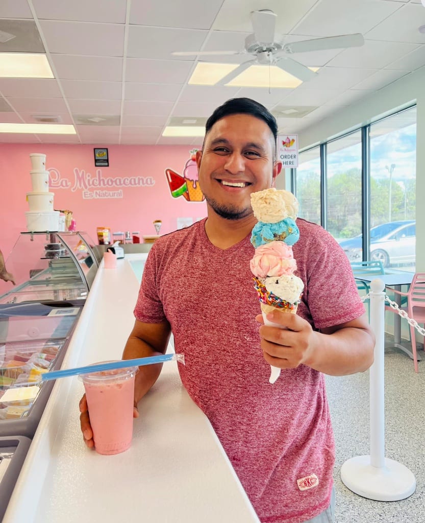 Happy smiling customer with ice cream