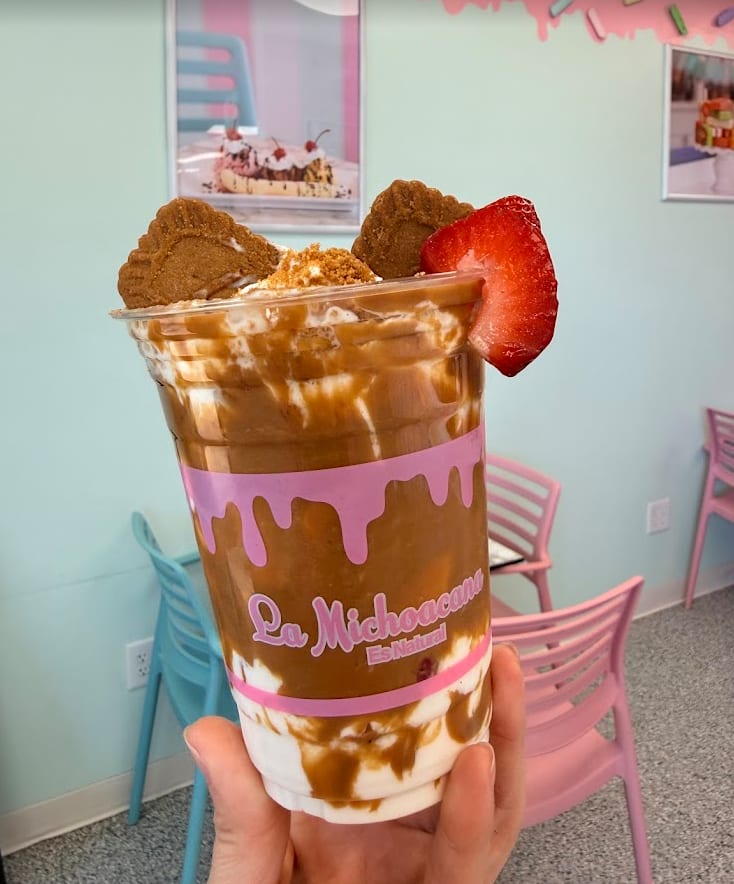 Colorful ice cream cone against the pink wall