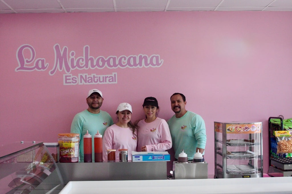 La Michoacana Es Natural team smiling behind the counter on opening day Gainesville GA