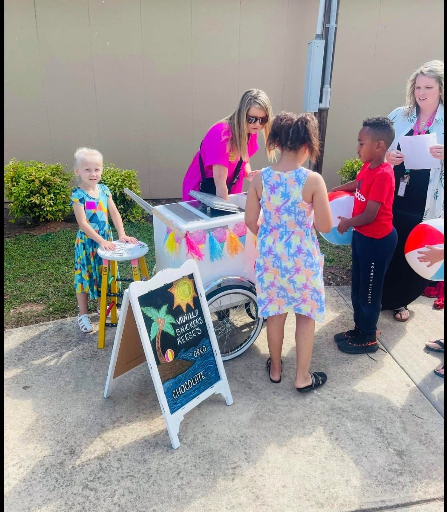 La Michoacana serving frozen paletas to kids at school event East Hall Gainesville GA