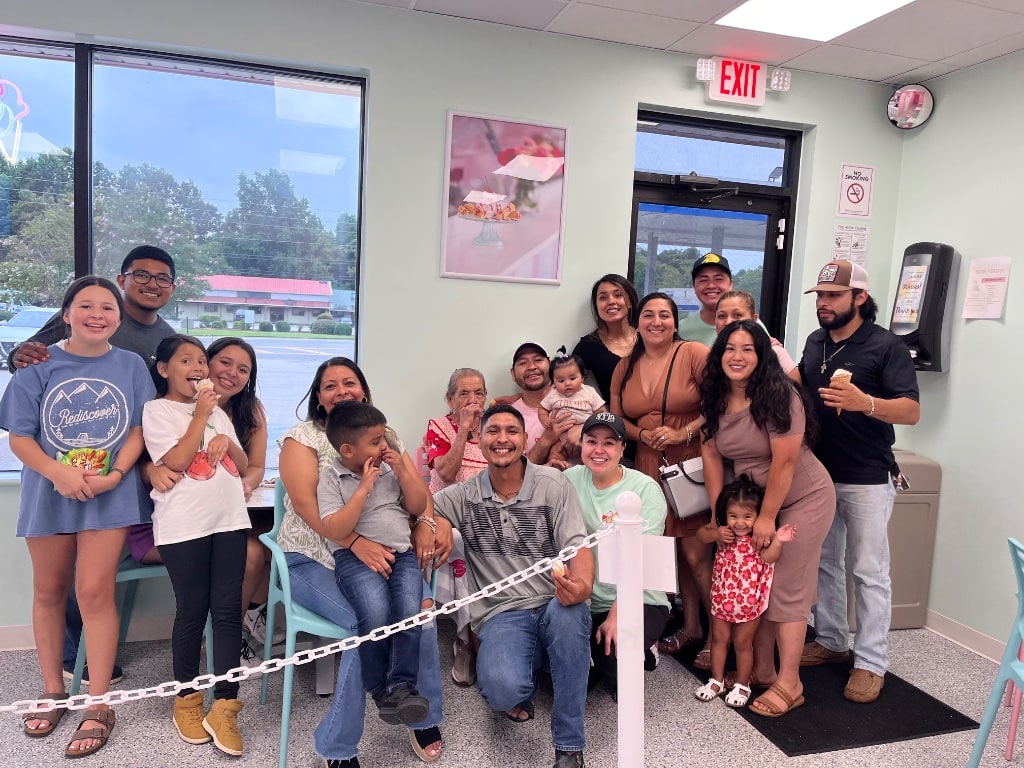 La Michoacana Es Natural family gathered together inside the ice cream shop Gainesville GA